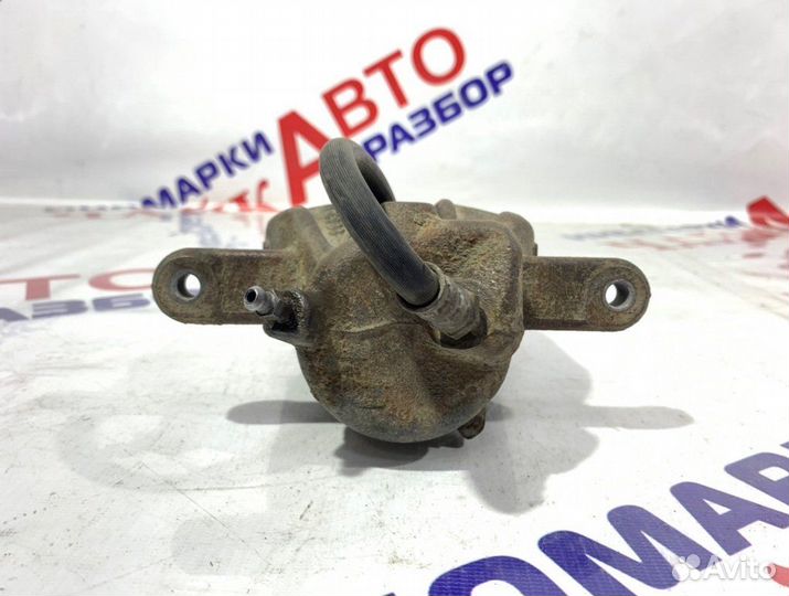 Суппорт тормозной передний левый Nissan Almera G15