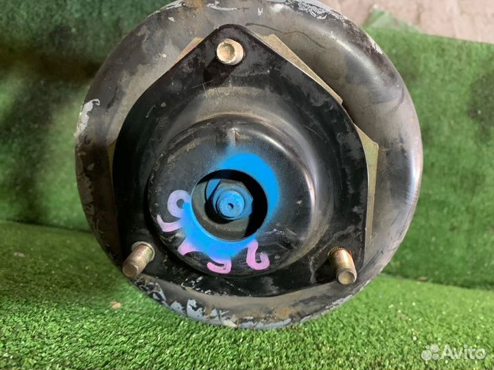 Стойка подвески передняя левая Nissan Primera TP12