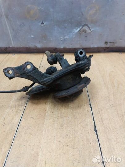 Поворотный кулак передний правый Opel Combo Z14XEP