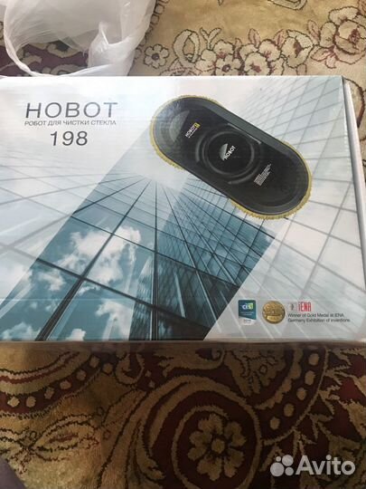 Робот для мойки стекол