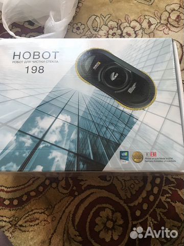 Робот для мойки стекол