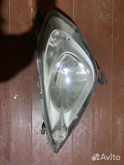 Фара левая передняя honda fit