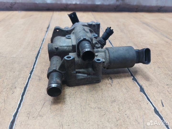 Корпус термостата Opel Astra H Z16XEP