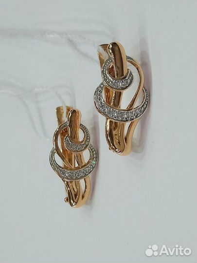 Золотые серьги с камнем