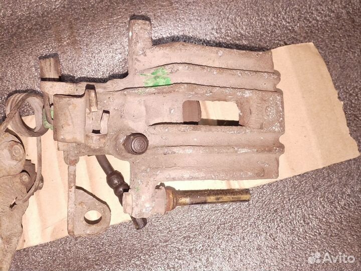 Суппорт задний Фольксваген Ауди