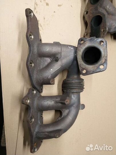 Коллектор выпускной 2.3 турбо Мазда сх7 оригинал