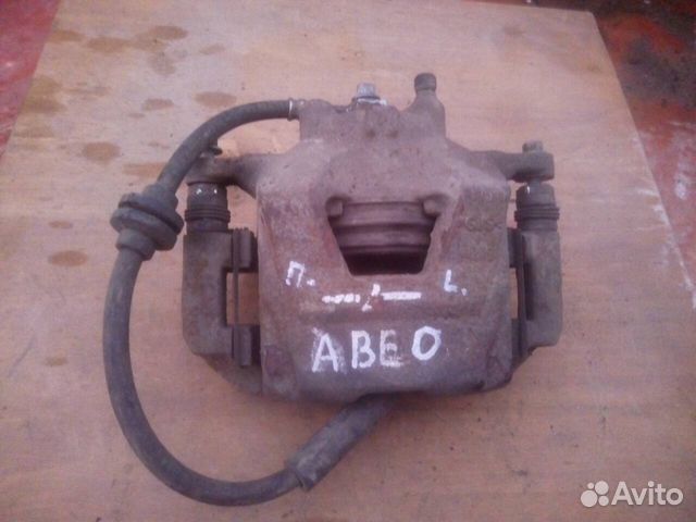 Суппорт передний левый Chevrolet Aveo (авео) 11г.в