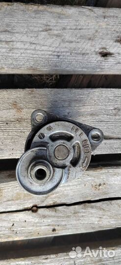 Натяжитель приводного ремня Мазда 6