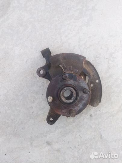 Поворотный кулак мазда 323BJ