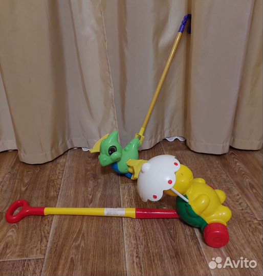 Игрушка каталка с ручкой детская