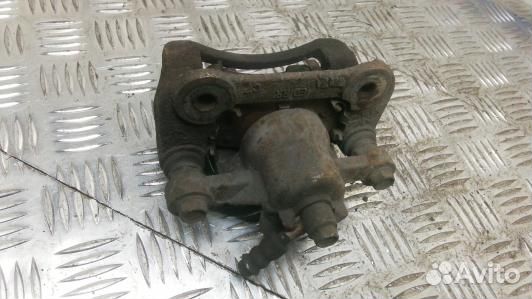 Суппорт тормозной задний правый KIA CEE'D 1 (NBR03