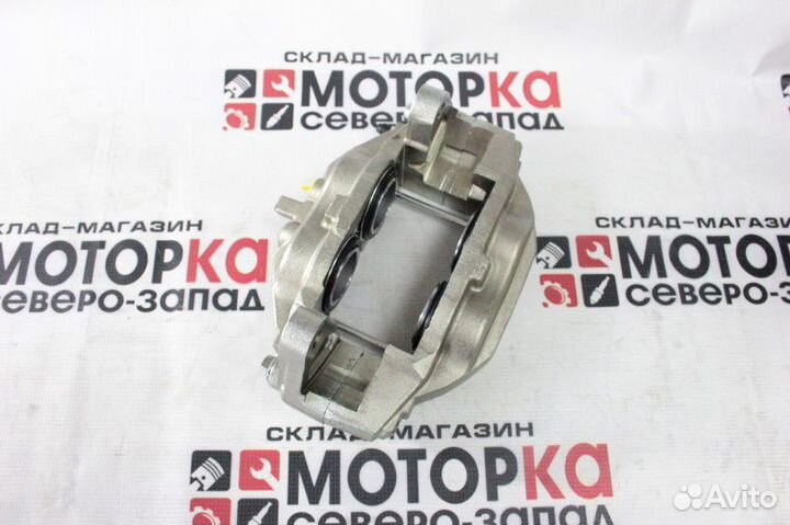 Суппорт тормозной передний левый Toyota Land