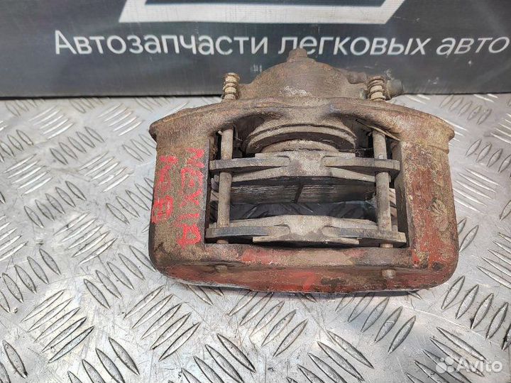 Суппорт тормозной передний левый Daewoo Nexia