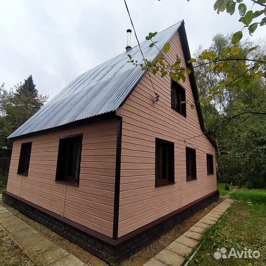 Сайдинг виниловый Docke LUX под дерево брус орех