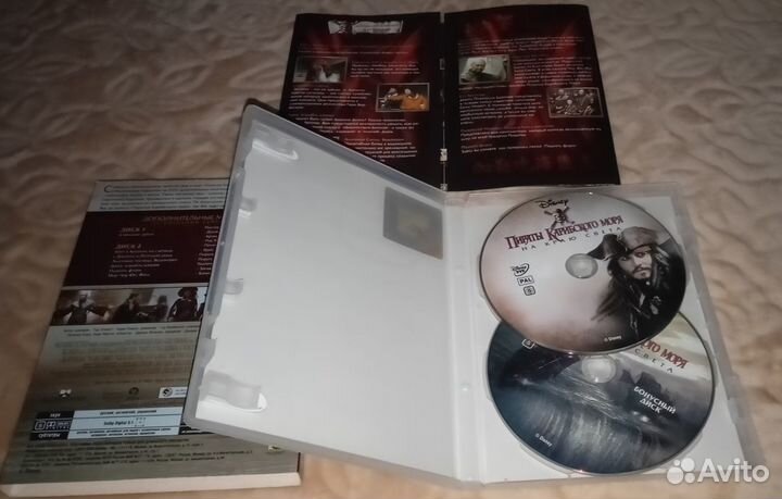 Коллекционные диски Титаник/Пираты Карибского моря