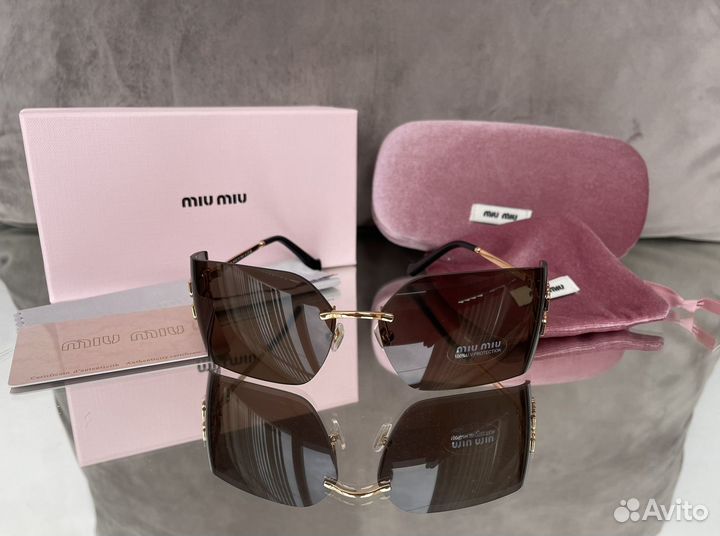 Солнцезащитные очки MIU MIU