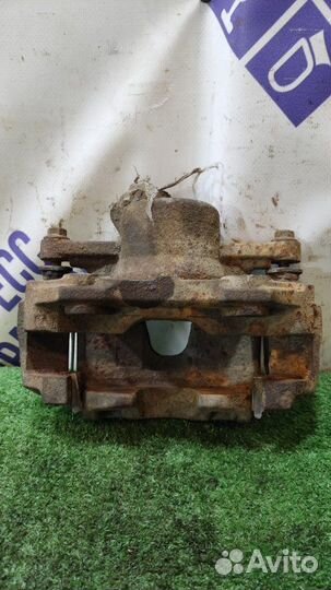 Суппорт передний левый Volkswagen Polo седан 1.6