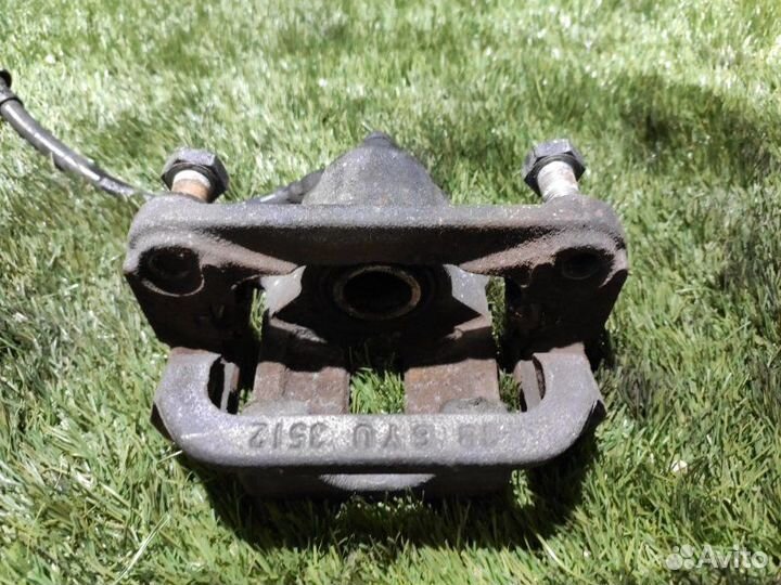 Суппорт тормозной задний правый Nissan X-Trail T30