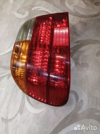 Фонарь задний левый Бмв е38