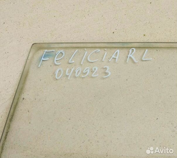 Стекло двери задней левой Felicia
