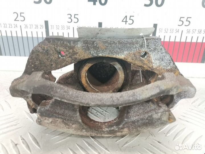 Суппорт передний правый Ford Escort 5 рест. 1994