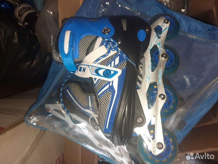 Роликовые коньки