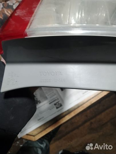 Наружный левый фонарь оригинал Тойота Королла