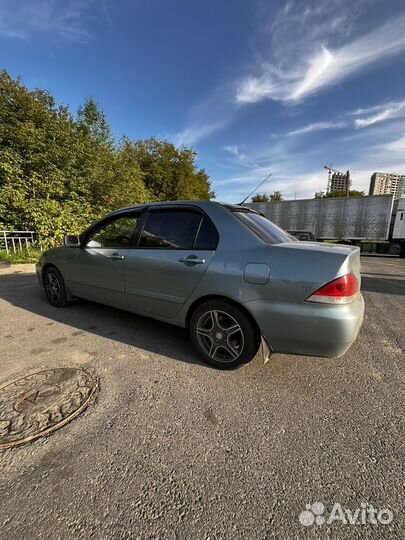 Mitsubishi Lancer 1.6 МТ, 2006, 197 000 км