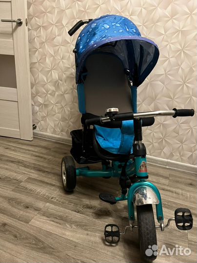 Трехколесный велосипед с ручкой