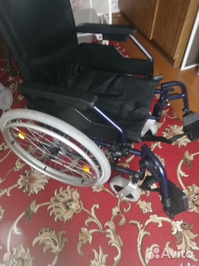 Инвалидная коляска