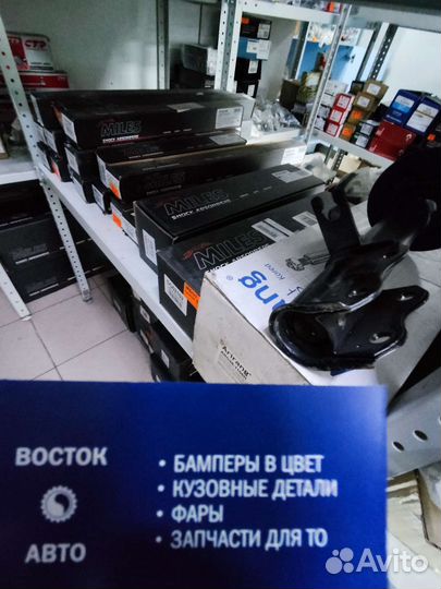 Передний левый амортизатор lancer 9