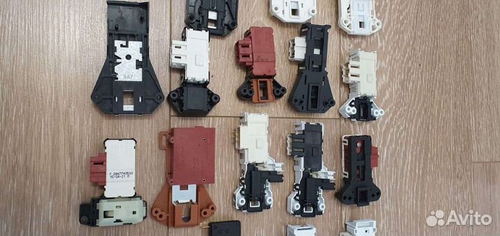 Устройство блокировки люка стиральной машины