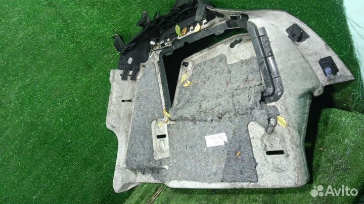 Обшивка багажника левая Opel Astra