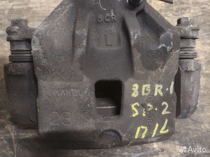 Суппорт Передний левый Kia Sportage 2