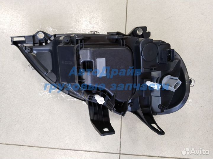 Фара головного света Freightliner Columbia левая