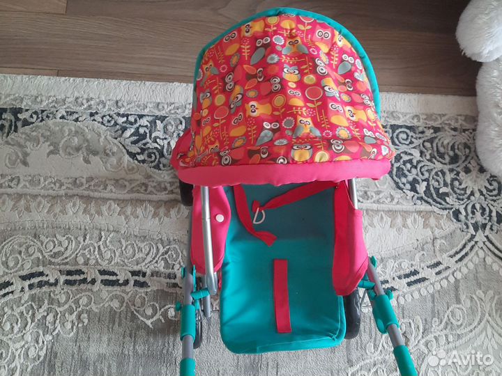 Игрушечная коляска для кукол