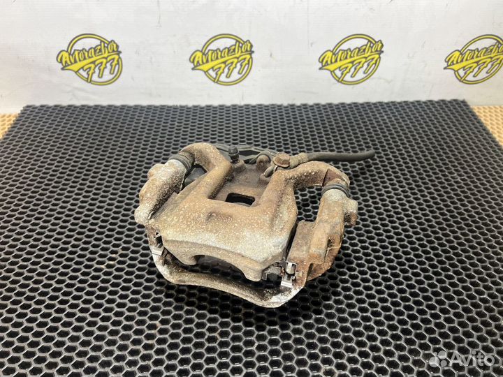 Суппорт тормозной задний левый Lexus NX200T