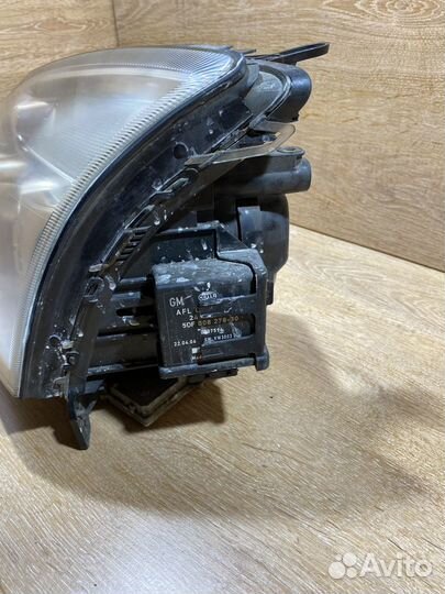 Фара левая Opel Vectra C дорест адаптивная 141059