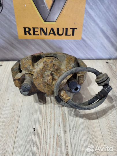 Суппорт тормозной перед Renault scenic 3 Прав