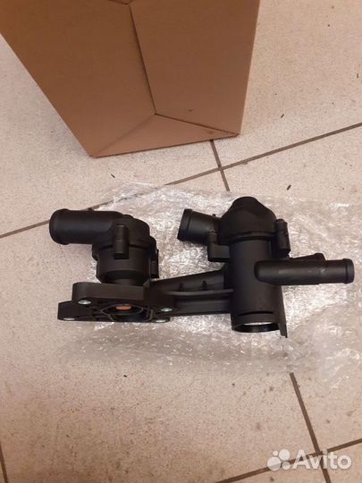 Термостат с корпусом VW Jetta,Polo, Rapid,Fabia