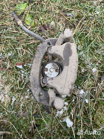 Суппорт тормозной задний левый Colt Z3 Европа