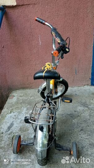 Детский велосипед с приставными колесами