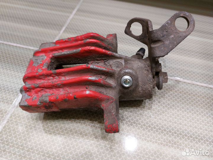 Суппорт тормозной задний правый octavia