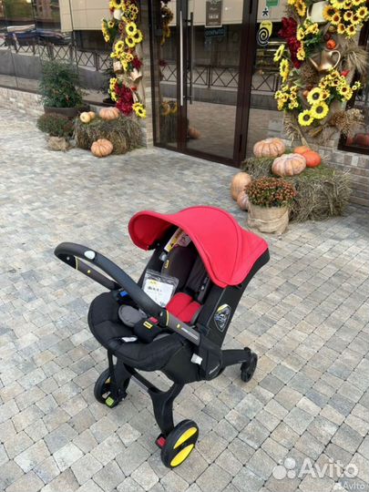 Продам автолюоьку коляску Doona