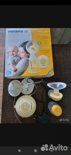Молокоотсос medela электрический