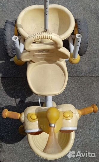 Детский велосипед с музыкой, светом и ручкой сзади