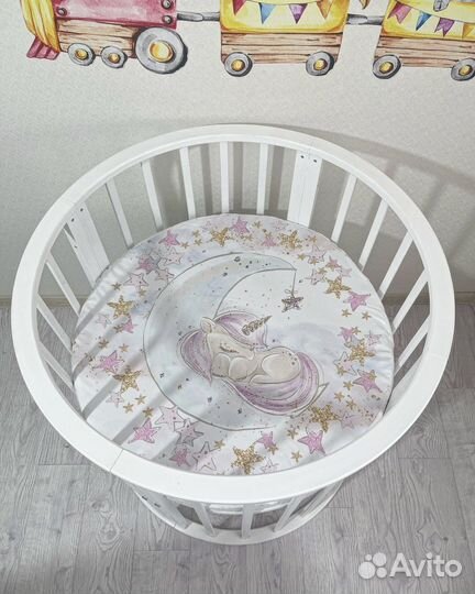 Новая простынь на резинке в круглую кроватку