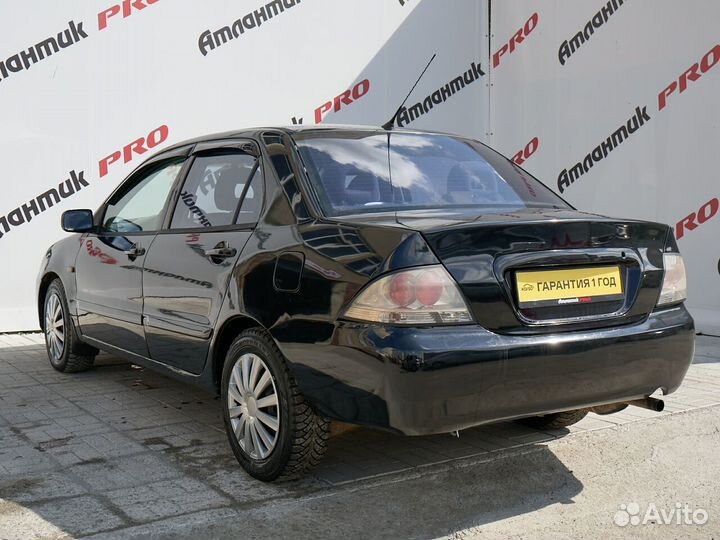 Mitsubishi Lancer 1.6 МТ, 2005, 301 429 км