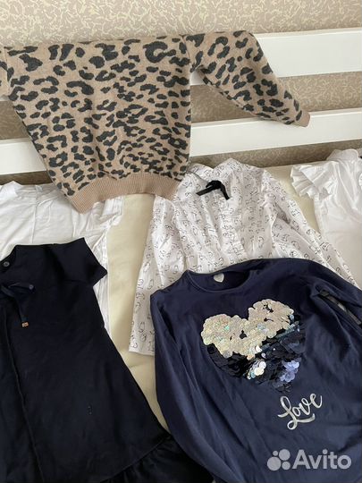 Два пакета вещей от 122 до 134 см