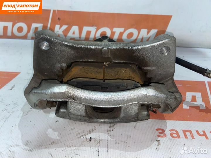 Суппорт тормозной передний правый Mazda 3 BM рест